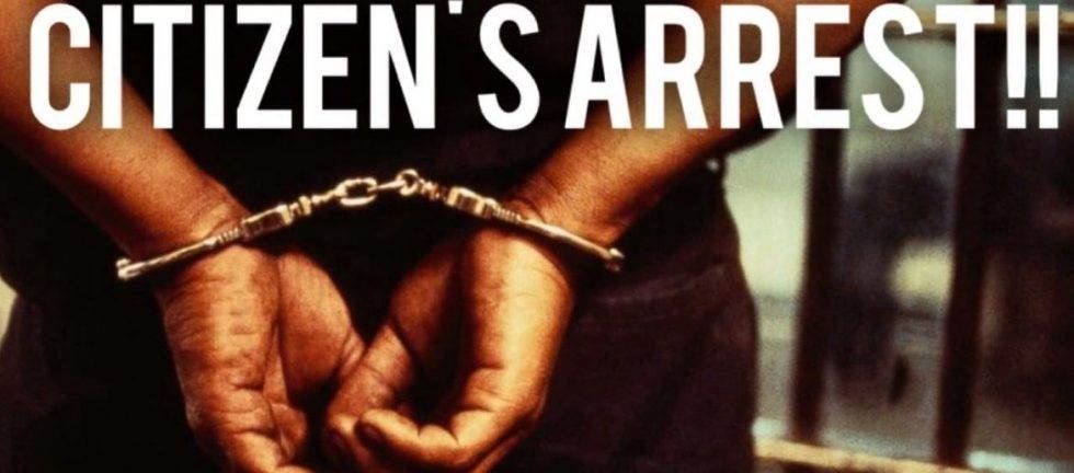 Person's hands cuffed in a citizen's arrest.