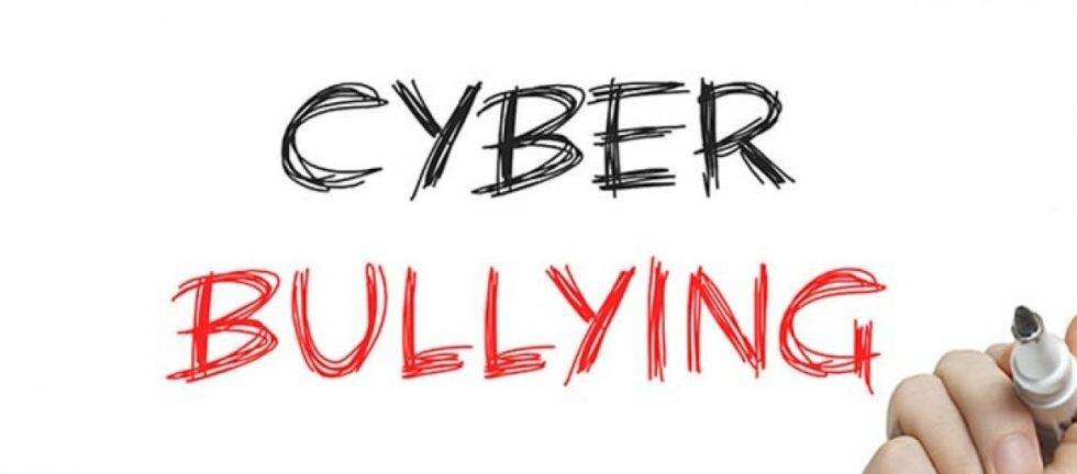 Handwritten words "Cyber Bullying" in red and black.