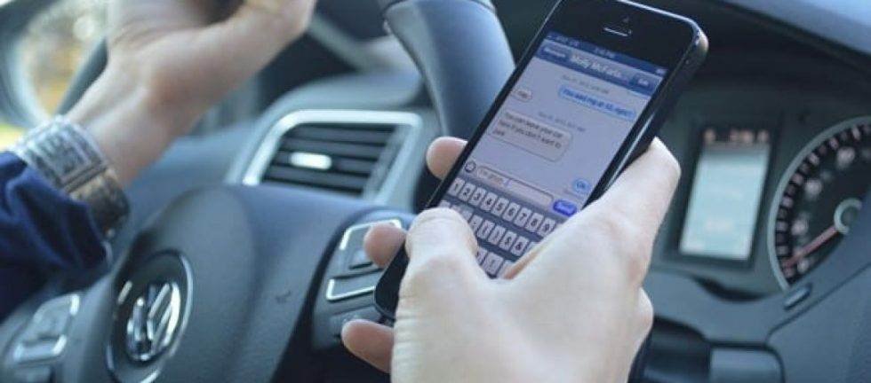 Driver texting while driving, dangerous distracted driving