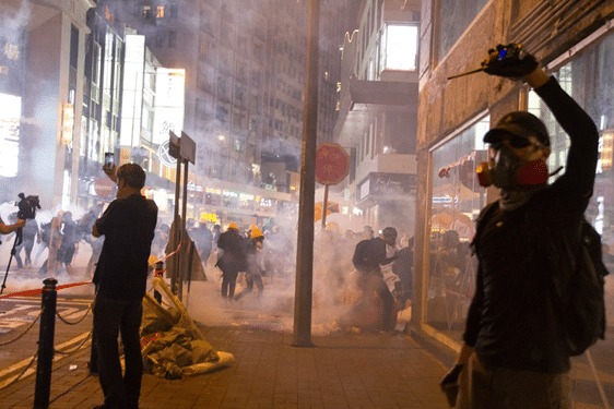 Protest scene illustrating the difference between affray, riot, and violent disorder in NSW public order offences.