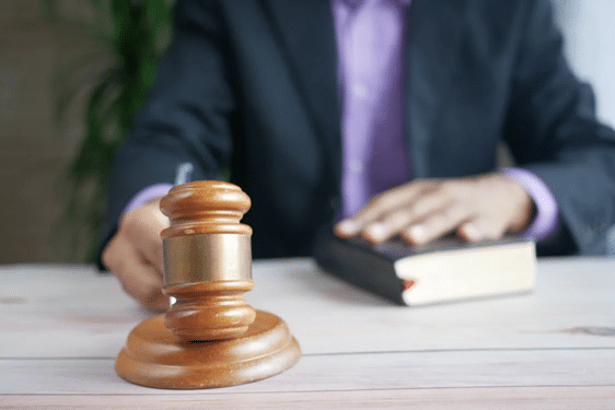 A judge with a gavel and book, symbolizing NSW Court of Criminal Appeal and the appeal process guide.