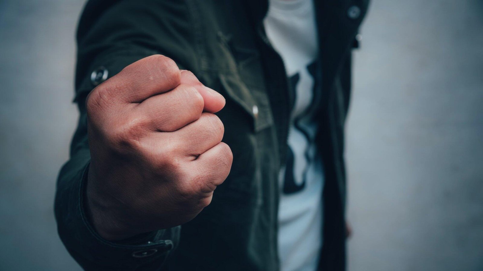 Close-up of a clenched fist symbolizing One Punch Laws in NSW: Assault Causing Death Penalties, Mandatory Sentences.