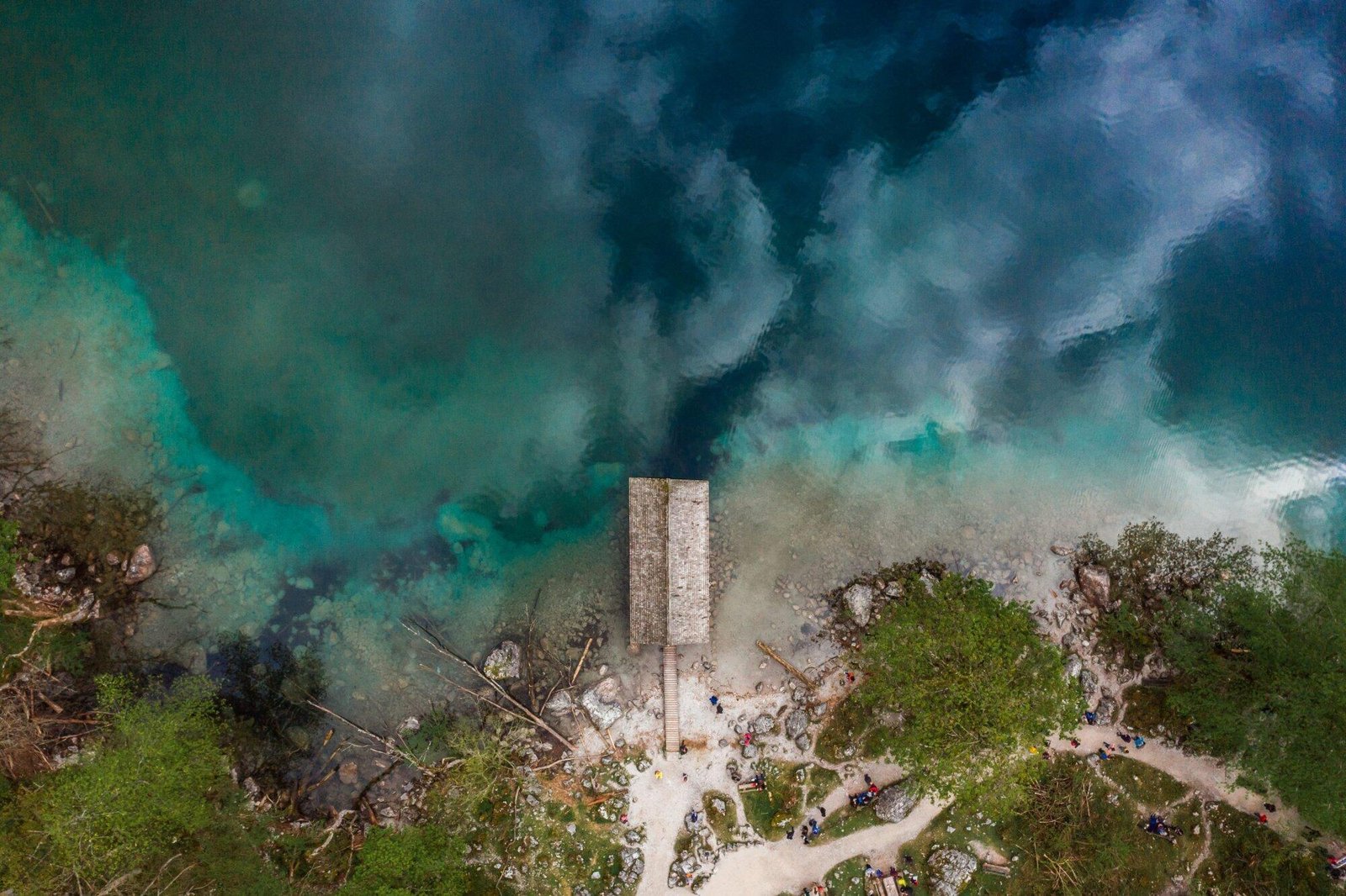 Aerial view of a pier and natural landscape, highlighting the importance of environmental offences penalties in NSW.